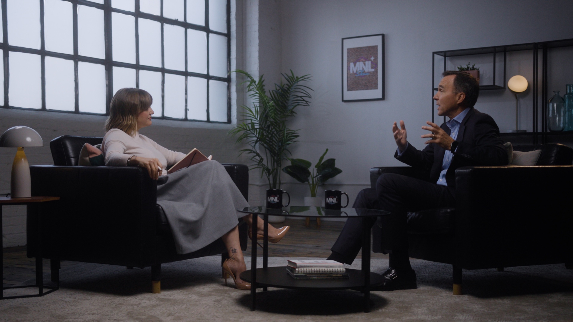 Emily Cormier hosting an interview on The MNL Show